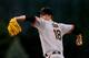 DENVER, CO - MAY 16: Starting pitcher Matt Cain #18 of the San Francisco Giants delivers to home plate during the first inning against the Colorado Rockies at Coors Field on May 16, 2013 in Denver, Colorado. (Photo by Justin Edmonds/Getty Images)