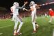 Nov 17, 2012; Madison, WI, USA; Ohio State Buckeyes defensive back Corey Brown (3) celebrates with defensive back Orhian Johnson (19) following the game against the Wisconsin Badgers at Camp Randall Stadium. Ohio State defeated Wisconsin 21-14 in overtime. Mandatory Credit: Jeff Hanisch-USA TODAY Sports