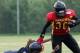 Chatterton evading a would-be tackler with the Lady Gladiators