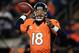 DENVER, CO - JANUARY 12: Peyton Manning #18 of the Denver Broncos throws an 17-yard touchdown pass to Demaryius Thomas #88 in the third quarter against the Baltimore Ravens during the AFC Divisional Playoff Game at Sports Authority Field at Mile High on January 12, 2013 in Denver, Colorado. (Photo by Doug Pensinger/Getty Images)