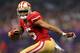 NEW ORLEANS, LA - FEBRUARY 03: Michael Crabtree #15 of the San Francisco 49ers runs in for a touchdown in the second half against the Baltimore Ravens during Super Bowl XLVII at the Mercedes-Benz Superdome on February 3, 2013 in New Orleans, Louisiana. (Photo by Mike Ehrmann/Getty Images)