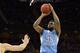 Mar 24, 2013; Kansas City, MO, USA; North Carolina Tar Heels guard Reggie Bullock (35) shoots against the Kansas Jayhawks in the second half during the third round of the NCAA basketball tournament at the Sprint Center. Mandatory Credit: Peter G. Aiken-USA TODAY Sports