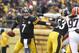 PITTSBURGH, PA - DECEMBER 30: Ben Roethlisberger #7 of the Pittsburgh Steelers is pushed out of the pocket against the Cleveland Browns during the game on December 30, 2012 at Heinz Field in Pittsburgh, Pennsylvania. The Steelers defeated the Browns 24-10. (Photo by Justin K. Aller/Getty Images)