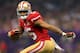 NEW ORLEANS, LA - FEBRUARY 03: Michael Crabtree #15 of the San Francisco 49ers runs in for a touchdown in the second half against the Baltimore Ravens during Super Bowl XLVII at the Mercedes-Benz Superdome on February 3, 2013 in New Orleans, Louisiana. (Photo by Mike Ehrmann/Getty Images)