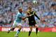 LONDON, ENGLAND - APRIL 14: Vincent Kompany of Manchester City and Fernando Torres of Chelsea tussle for the ball during the FA Cup with Budweiser Semi Final match between Chelsea and Manchester City at Wembley Stadium on April 14, 2013 in London, England. (Photo by Shaun Botterill/Getty Images)