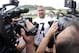 May 21, 2013; Pittsburgh, PA, USA; Pittsburgh Steelers quarterback Ben Roethlisberger (7) is interviewed by members of the media after participating in organized team activities at the UPMC Sports Complex. Mandatory Credit: Charles LeClaire-USA TODAY Sports