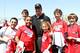 Apr 24, 2013; New York, NY, USA; NFL commissioner Roger Goodell (center) poses for photos at the NFL Play 60 Youth Football Festival at Chelsea Waterside Park. Mandatory Credit: Debby Wong-USA TODAY Sports