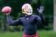 May 23, 2013; Ashburn, VA, USA; Washington Redskins quarterback Robert Griffin III (10) throws the ball during organized team activities at Redskins Park. Mandatory Credit: Geoff Burke-USA TODAY Sports