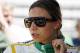 May 16, 2012; Indianapolis, IN, USA; IndyCar Series driver Simona de Silvestro watches from the pits during practice for the Indianapolis 500 at the Indianapolis Motor Speedway. Mandatory Credit: Brian Spurlock-USA TODAY Sports