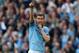 MANCHESTER, ENGLAND - MAY 07: Edin Dzeko of Manchester City celebrates scoring the opening goal during the Barclays Premier League match between Manchester City and West Bromwich Albion at the Etihad Stadium on May 07, 2013 in Manchester, England. (Photo by Clive Brunskill/Getty Images)
