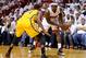 MIAMI, FL - MAY 22: LeBron James #6 of the Miami Heat handles the ball against Paul George #24 of the Indiana Pacers in the first quarter during Game One of the Eastern Conference Finals at AmericanAirlines Arena on May 22, 2013 in Miami, Florida. NOTE TO USER: User expressly acknowledges and agrees that, by downloading and or using this photograph, user is consenting to the terms and conditions of the Getty Images License Agreement. (Photo by Mike Ehrmann/Getty Images)