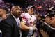 Feb 5, 2012; Indianapolis, IN, USA; New York Giants quarterback Eli Manning (10) is surrounded by members of the media after Super Bowl XLVI against the New England Patriots at Lucas Oil Stadium. Mandatory Credit: Matthew Emmons-USA TODAY Sports