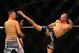Dec 30, 2011; Las Vegas, NV, USA; UFC fighter Donald Cerrone (right) against Nate Diaz during a lightweight bout at UFC 141 at the MGM Grand Garden event center. Mandatory Credit: Mark J. Rebilas-USA TODAY Sports