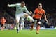GLASGOW, SCOTLAND - APRIL 14: Gary Hooper of Celtic battles with Barry Douglas of Dundee United during The William Hill Scottish Cup Semi Final between Dundee United and Celtic at Hampden Park on April 14, 2013 in Glasgow, United Kingdom. (Photo by Jamie McDonald/Getty Images)