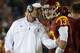 LOS ANGELES, CA - NOVEMBER 24: Max Wittek #13 of the USC Trojans gets a word from Head Coach Lane Kiffin after his touchdown pass to Robert Woods #2 during the game against the Notre Dame Fighting Irish at Los Angeles Memorial Coliseum on November 24, 2012 in Los Angeles, California. (Photo by Harry How/Getty Images)