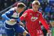 READING, ENGLAND - APRIL 06: Luke Shaw of Southampton is closed down by Chris Gunter of Reading during the Barclays Premier League match between Reading and Southampton at the Madejski Stadium on April 6, 2013 in Reading, England. (Photo by Ian Walton/Getty Images)