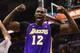 SAN ANTONIO, TX - APRIL 24: Dwight Howard #12 of the Los Angeles Lakers reacts after being fouled against the San Antonio Spurs during Game Two of the Western Conference Quarterfinals of the 2013 NBA Playoffs at AT&T Center on April 24, 2013 in San Antonio, Texas. NOTE TO USER: User expressly acknowledges and agrees that, by downloading and or using this photograph, User is consenting to the terms and conditions of the Getty Images License Agreement. (Photo by Ronald Martinez/Getty Images)
