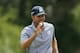 FORT WORTH, TX - MAY 25: Matt Kuchar waves to the gallery after a birdie on the 11th hole during the third round of the Crowne Plaza Invitational at Colonial at Colonial Country Club on May 25, 2013 in Fort Worth, Texas. (Photo by Scott Halleran/Getty Images)