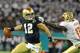ORLANDO, FL - DECEMBER 29: Quarterback Andrew Hendrix #12 of the Notre Dame Fight Irish runs from the pocket against the Florida State Seminoles in the Champs Sports Bowl December 29, 2011 at the Florida Citrus Bowl in Orlando, Florida. FSU won 18 - 14. (Photo by Al Messerschmidt/Getty Images)