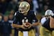 SOUTH BEND, IN - OCTOBER 20:Tommy Rees #11 of the Notre Dame Fighting Irish turns to hand-off against the BYU Cougars at Notre Dame Stadium on October 20, 2012 in South Bend, Indiana. Notre Dame defeated BYU 17-14. (Photo by Jonathan Daniel/Getty Images)