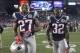 Dec 10, 2012; Foxborough, MA USA; New England Patriots safety Tavon Wilson (27) - cornerback Devin McCourty (32) and cornerback Alfonzo Dennard (37) walk off the field following a game against the Houston Texans at Gillette Stadium. The Patriots won 42-14. Mandatory Credit: Stew Milne-USA TODAY Sports