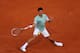 PARIS, FRANCE - MAY 28: Novak Djokovic of Serbia plays a forehand in his Men's Singles match against David Goffin of Belgium during day three of the French Open at Roland Garros on May 28, 2013 in Paris, France. (Photo by Julian Finney/Getty Images)