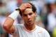 PARIS, FRANCE - MAY 27: Rafael Nadal of Spain holds his head during his Men's Singles match against Daniel Brands of Germany during day two of the French Open at Roland Garros on May 27, 2013 in Paris, France. (Photo by Getty Images/Getty Images)