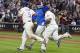 May 28, 2013; New York, NY, USA; New York Mets starting pitcher Matt Harvey (center) high third baseman David Wright (5) in front of right fielder Marlon Byrd (6) after a bottom of the ninth inning comeback and walk off win against the New York Yankees at Citi Field. Mandatory Credit: Brad Penner-USA TODAY Sports