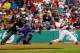 BOSTON, MA - MAY 11: Dustin Pedroia #15 of the Boston Red Sox hits an RBI single against the Toronto Blue Jays to tie the game at two runs each during the game on May 11, 2013 at Fenway Park in Boston, Massachusetts. (Photo by Jared Wickerham/Getty Images)