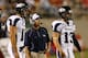 LAS VEGAS - OCTOBER 02: Nevada Reno Wolf Pack head coach Chris Ault (C) is flanked by quarterbacks Tyler Lantrip #16 and Mason Magleby #13 as Ault watches his players take on the UNLV Rebels at Sam Boyd Stadium October 2, 2010 in Las Vegas, Nevada. Nevada Reno won 44-26. (Photo by Ethan Miller/Getty Images)