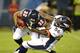 Aug 09, 2012; Chicago, IL, USA; Denver Broncos linebacker Nate Irving (56) tackles Chicago Bears running back Kahlil Bell (32) in the back field during the second quarter at Soldier Field. Mandatory Credit: Mike DiNovo-USA TODAY Sports