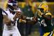 GREEN BAY, WI - JANUARY 05: Quarterback Joe Webb #14 of the Minnesota Vikings tries to push back outside linebacker Dezman Moses #54 of the Green Bay Packers to avoid a sack in the second quarter during the NFC Wild Card Playoff game at Lambeau Field on January 5, 2013 in Green Bay, Wisconsin. (Photo by Jonathan Daniel/Getty Images)