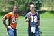 June 4, 2012; Englewood, CO, USA; Denver Broncos quarterback Peyton Manning (18) speaks to wide receiver Demaryius Thomas (88) following organized team activities at the Broncos training facility. Mandatory Credit: Ron Chenoy-USA TODAY Sports