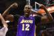 SAN ANTONIO, TX - APRIL 24: Dwight Howard #12 of the Los Angeles Lakers reacts after being fouled against the San Antonio Spurs during Game Two of the Western Conference Quarterfinals of the 2013 NBA Playoffs at AT&T Center on April 24, 2013 in San Antonio, Texas. NOTE TO USER: User expressly acknowledges and agrees that, by downloading and or using this photograph, User is consenting to the terms and conditions of the Getty Images License Agreement. (Photo by Ronald Martinez/Getty Images)
