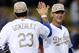LOS ANGELES, CA - MAY 27: Manager Don Mattingly and Adrian Gonzalez #23 the Los Angeles Dodgers high five after the game against the Los Angeles Angels of Anaheim at Dodger Stadium on May 27, 2013 in Los Angeles, California. The Dodgers won 8-7. (Photo by Stephen Dunn/Getty Images)