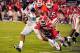 ATHENS, GA - NOVEMBER 3: I'Tavius Mathers #5 of the Ole Miss Rebels is tackled by Josh Harvey-Clemons #25 of the Georgia Bulldogs at Sanford Stadium on November 3, 2012 in Athens, Georgia. (Photo by Scott Cunningham/Getty Images)