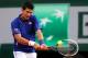 PARIS, FRANCE - MAY 30: Novak Djokovic of Serbia plays a backhand in his Men's Singles match against Guido Pella of Argentina during day five of the French Open at Roland Garros on May 30, 2013 in Paris, France. (Photo by Clive Brunskill/Getty Images)
