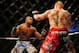 Dec 30, 2011; Las Vegas, NV, USA; UFC fighter Alistair Overeem (left) against Brock Lesnar during a heavyweight bout at UFC 141 at the MGM Grand Garden event center. Mandatory Credit: Mark J. Rebilas-USA TODAY Sports
