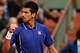PARIS, FRANCE - MAY 30: Novak Djokovic of Serbia celebrates match point in his Men's Singles match against Guido Pella of Argentina during day five of the French Open at Roland Garros on May 30, 2013 in Paris, France. (Photo by Clive Brunskill/Getty Images)