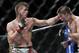 May 25, 2013; Las Vegas, NV, USA; Mike Pyle punches Rick Story during UFC 160 at the MGM Grand Garden Arena. Mandatory Credit: Gary A. Vasquez-USA TODAY Sports