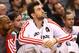 Feb 22, 2013; Toronto, ON, Canada; Toronto Raptors center Andrea Bargnani (7) looks on from the bench against the New York Knicks at the Air Canada Centre. The Raptors beat the Knicks 100-98. Mandatory Credit: Tom Szczerbowski-USA TODAY Sports
