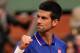 PARIS, FRANCE - MAY 30: Novak Djokovic of Serbia celebrates match point in his Men's Singles match against Guido Pella of Argentina during day five of the French Open at Roland Garros on May 30, 2013 in Paris, France. (Photo by Clive Brunskill/Getty Images)