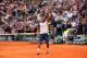 PARIS, FRANCE - JUNE 02: Jo-Wilfried Tsonga of France celebrates match point during his Men's Singles match against Viktor Troicki of Serbia during day eight of the French Open at Roland Garros on June 2, 2013 in Paris, France. (Photo by Julian Finney/Getty Images)