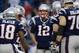 Jan 13, 2013; Foxboro, MA, USA; New England Patriots quarterback Tom Brady (12) huddles with his team before the AFC divisional round playoff game against the Houston Texans at Gillette Stadium. Mandatory Credit: Robert Deutsch-USA TODAY Sports