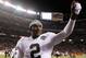 DENVER - DECEMBER 20: Quarterback JaMarcus Russell #2 celebrates following the Oakland Raiders' victory over the Denver Broncos at Invesco Field at Mile High on December 20, 2009 in Denver, Colorado. The Raiders defeated the Broncos 20-19. (Photo by Jeff Gross/Getty Images)