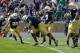 Apr 20, 2013; Notre Dame, IN, USA; Notre Dame Fighting Irish nose tackle Louis Nix (1) carries the ball for a two point conversion in the fourth quarter of the Blue-Gold Game at Notre Dame Stadium. Mandatory Credit: Matt Cashore-USA TODAY Sports