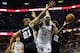 MEMPHIS, TN - MAY 25: Zach Randolph #50 of the Memphis Grizzlies goes up for a shot between Tim Duncan #21 and Tiago Splitter #22 of the San Antonio Spurs in the fourth quarter during Game Three of the Western Conference Finals of the 2013 NBA Playoffs at the FedExForum on May 25, 2013 in Memphis, Tennessee. NOTE TO USER: User expressly acknowledges and agrees that, by downloading and or using this photograph, User is consenting to the terms and conditions of the Getty Images License Agreement. (Photo by Kevin C. Cox/Getty Images)