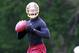 May 23, 2013; Ashburn, VA, USA; Washington Redskins quarterback Robert Griffin III (10) prepares to throw the ball during organized team activities at Redskins Park. Mandatory Credit: Geoff Burke-USA TODAY Sports