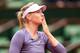 PARIS, FRANCE - MAY 31: Maria Sharapova of Russia celebrates match point in her Women's Singles match against Eugenie Bouchard of Canada during day six of the French Open at Roland Garros on May 31, 2013 in Paris, France. (Photo by Matthew Stockman/Getty Images)