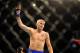 Alexander Gustafsson with hand raised in victory at UFC 141